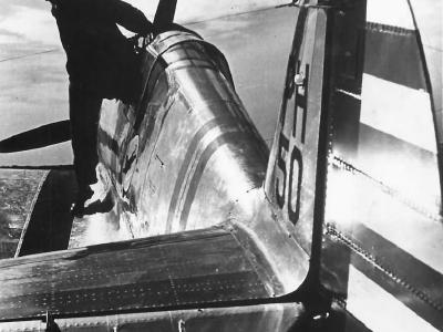 8th PG pilot steps from cockpit of P-36A 1941