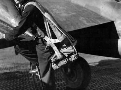 A Pilot Of the 94th Fighter Squadron 1st Fighter Group Climbs Into the Cockpit Of His P-38 Lightning Italy