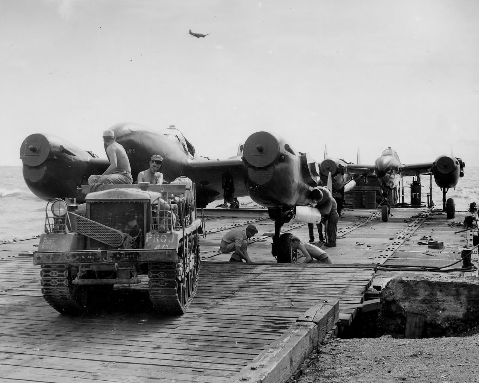 Clertrac Aircraft Tug Tows P-38 Lightning at Manila Docks 1945
