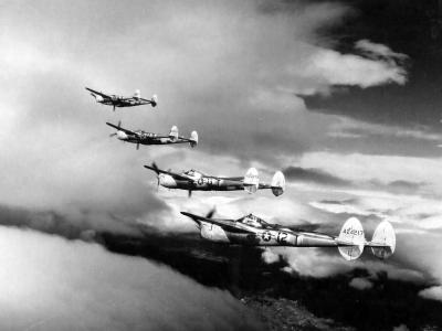 P-38 Lightnings Of the 15th Air Force In Formation Over Yugoslavia