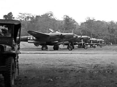 P-38 Lightnings of the 9th Fighter Squadron flight line at Dobodura May 1943