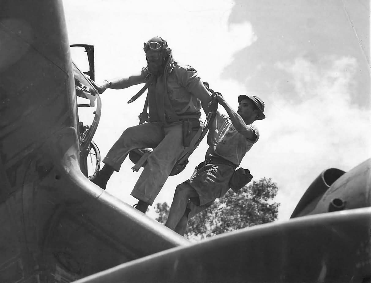 Pilot Lt Faurot Climbs into P-38 L