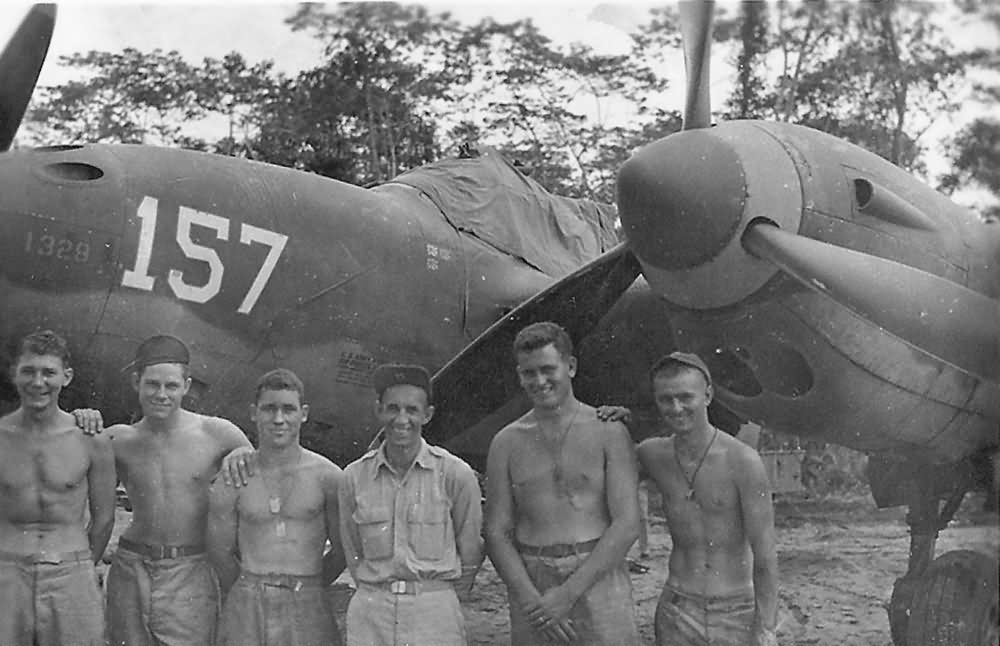 Pilots posed by P-38 of 475th FG with 3 Japanese Kills Recorded