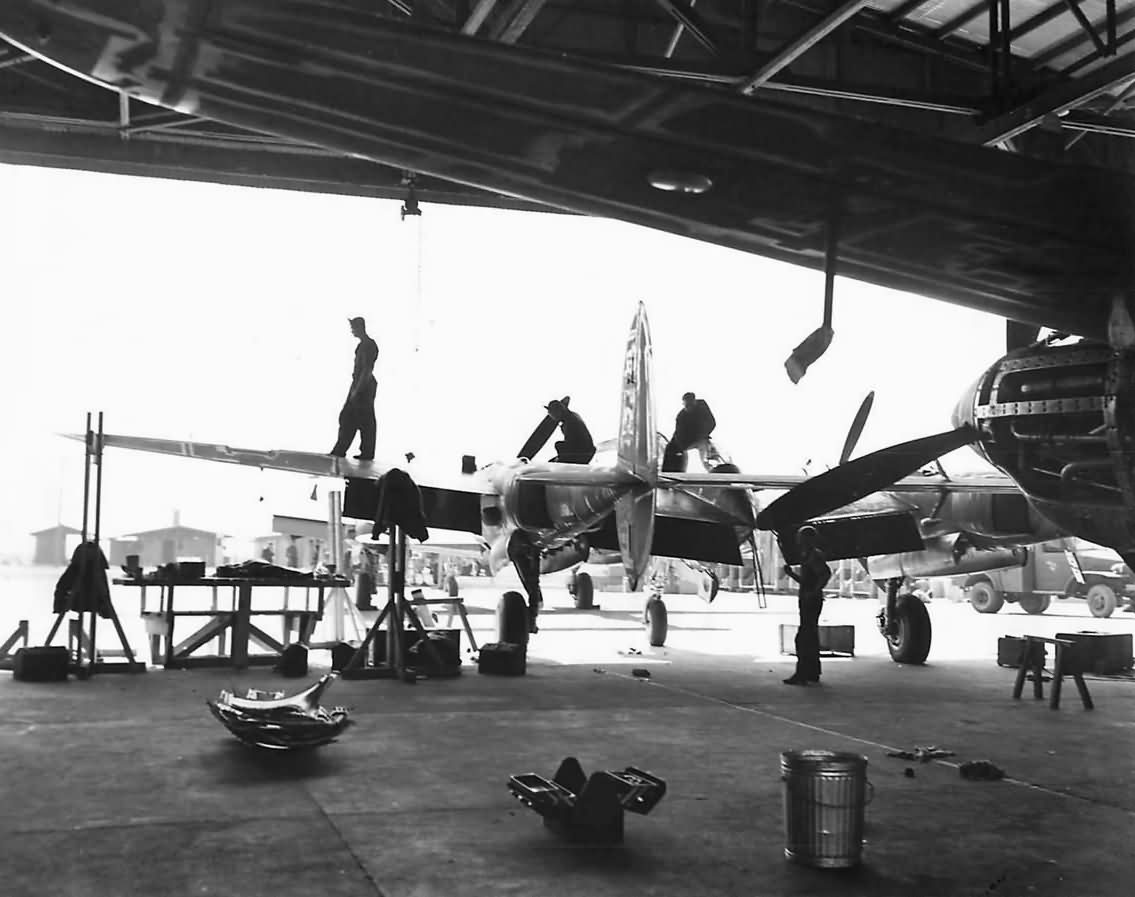 Soldiers Working on P-38 Lightning in Hanger in Australia 1942