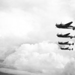 Lockheed P-38L Lightnings of 67th FS in flight during World War II