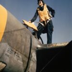 WASP Climbing into a P-38G 42-13534