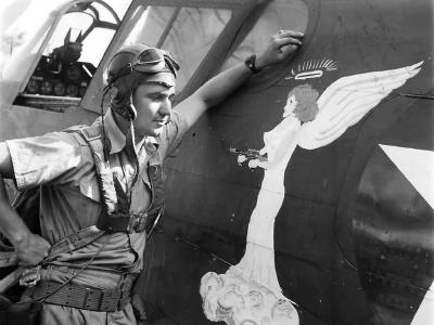 49th FG pilot Lt. John Angel by P-40 Nose Art 1942 Australia