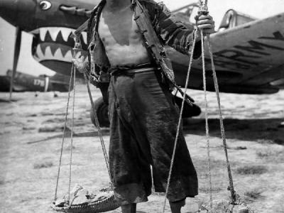 A Chinese Carrying Rock For The Construction Of A Field Of The 14th Air Force In China