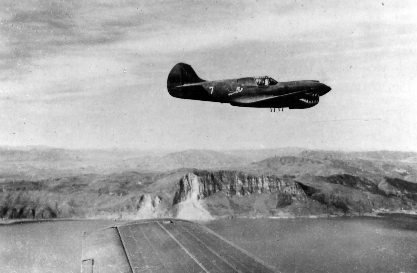 Col Clinton D. Vincent P-40K Peggy II over Kunming Lake