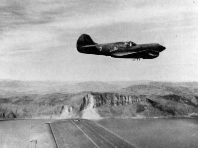 Col Clinton D. Vincent P-40K Peggy II over Kunming Lake