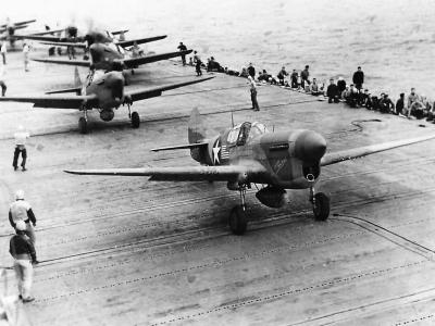 P-40F Warhawk of the 33rd FG aboard USS Chenango CVE-28 for Operation Torch November 10th 1942