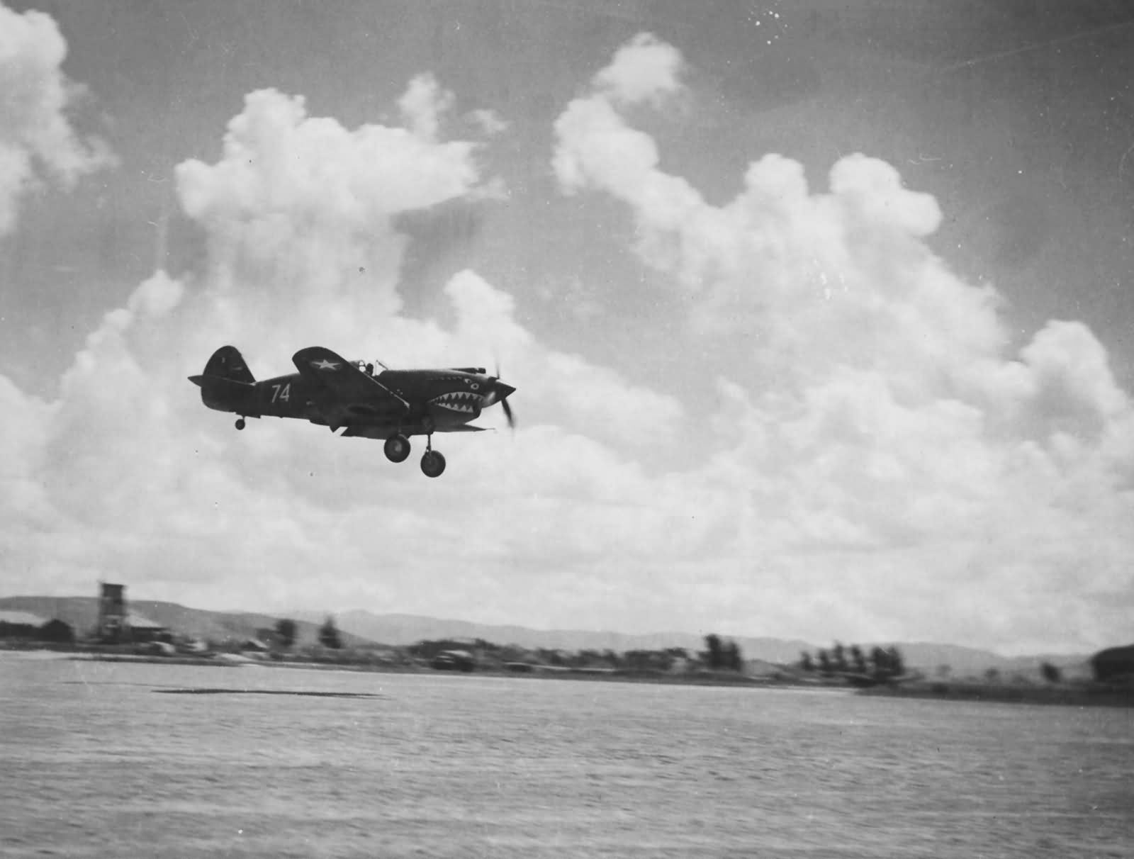 P-40A number 74 of the 23rd FG 14th AF, Approaches The Field For A Landing At Kunming China After A Mission. September 1942