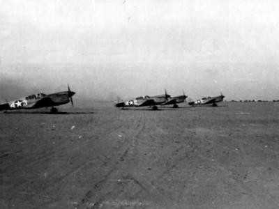P-40 Warhawks Taxi Up To The Take Off Line At An Airbase Near Burg El Arab Somewhere In North Africa