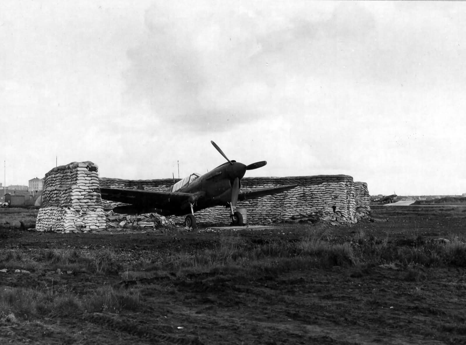 P-40 of the 2nd Service Group Parked In A Revetment Iceland
