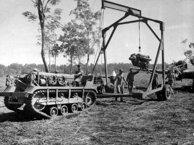 Removing engine from a P-40 Dobodura New Guinea