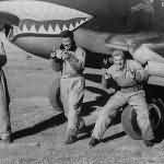 Flying Tiger AVG pilots and P-40B Tomahawk shark mouth nose art