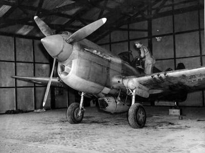 camera pod installation on a P-40 10th Combat Camera Unit