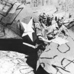 49th FG pilots checking map Australia 1942