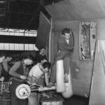 Employees at Curtiss-Wright working on P-40 landing gear ’41