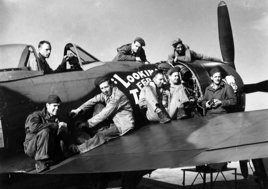 Ground crew of the 63rd FS, 56th Fighter Group and P-47