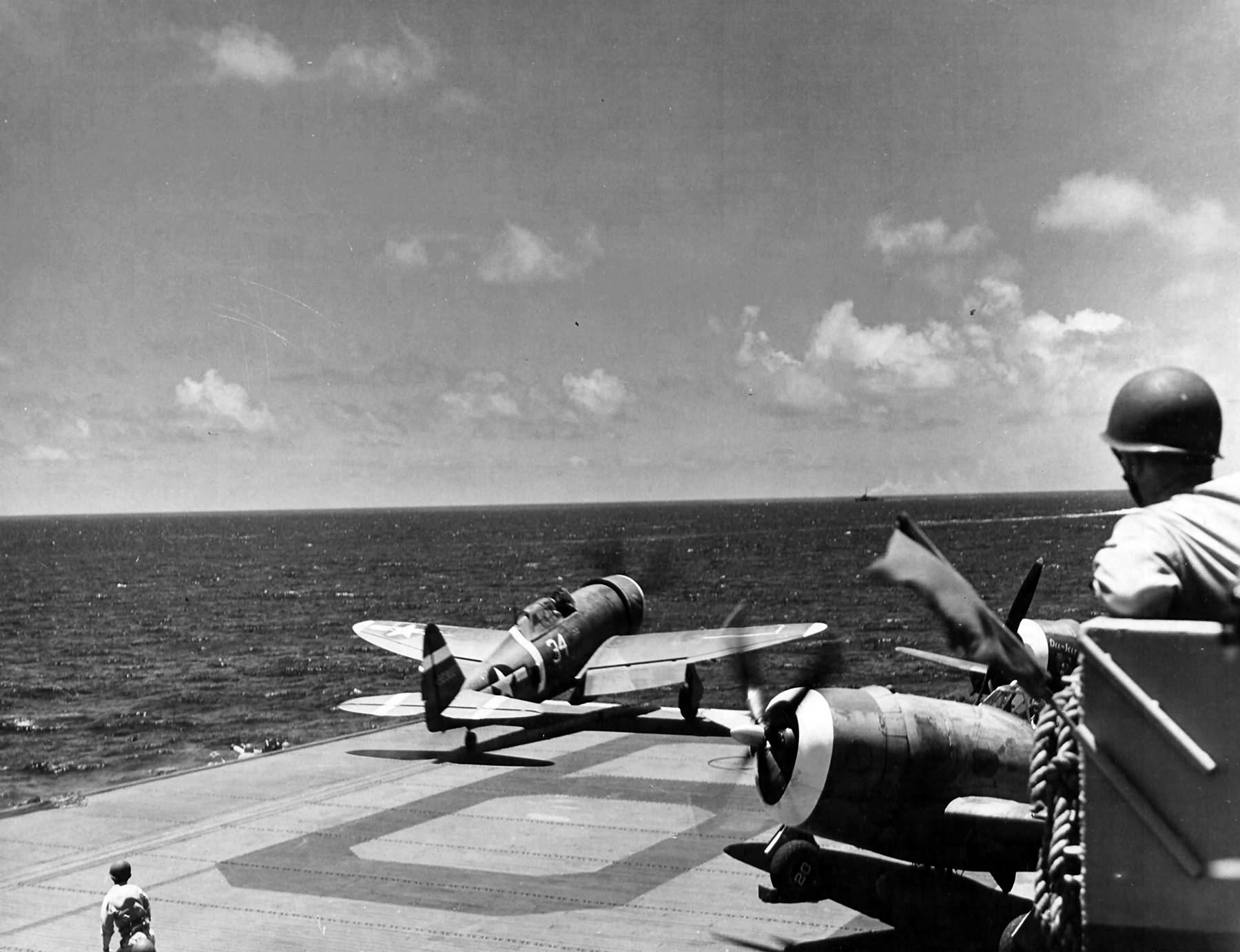 P-47 Thunderbolt #34 of the 73rd Fighter Squadron, 318th Fighter Group takes off from the USS Manila Bay CVE-61