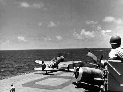 P-47 Thunderbolt #34 of the 73rd Fighter Squadron, 318th Fighter Group takes off from the USS Manila Bay CVE-61