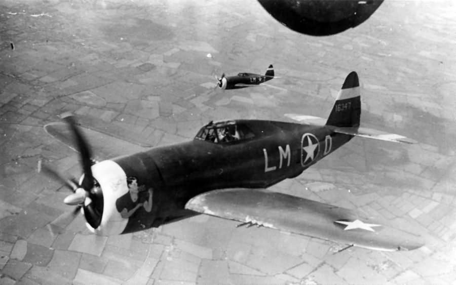 P-47C Thunderbolt code LM-O 41-6347 of the 56th Fighter Group escort a B-24