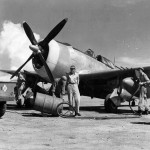 Mechanics of the 333rd Fighter Squadron, 318th Fighter Group Force napalm into 165 gallon fuel tank of P-47