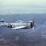 P-47 Thunderbolt 7J-V, 42-29140 of the 404th Fighter Group, 508th Fighter Squadron in flight over Belgium, March 1945