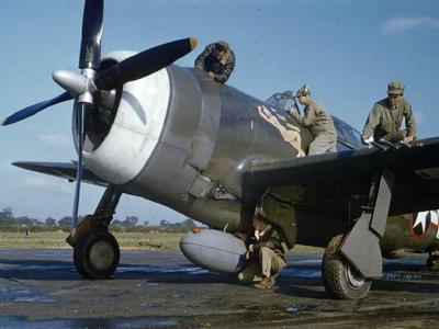 ground crew servicing the P-47 Thunderbolt flown by Captain Johnson