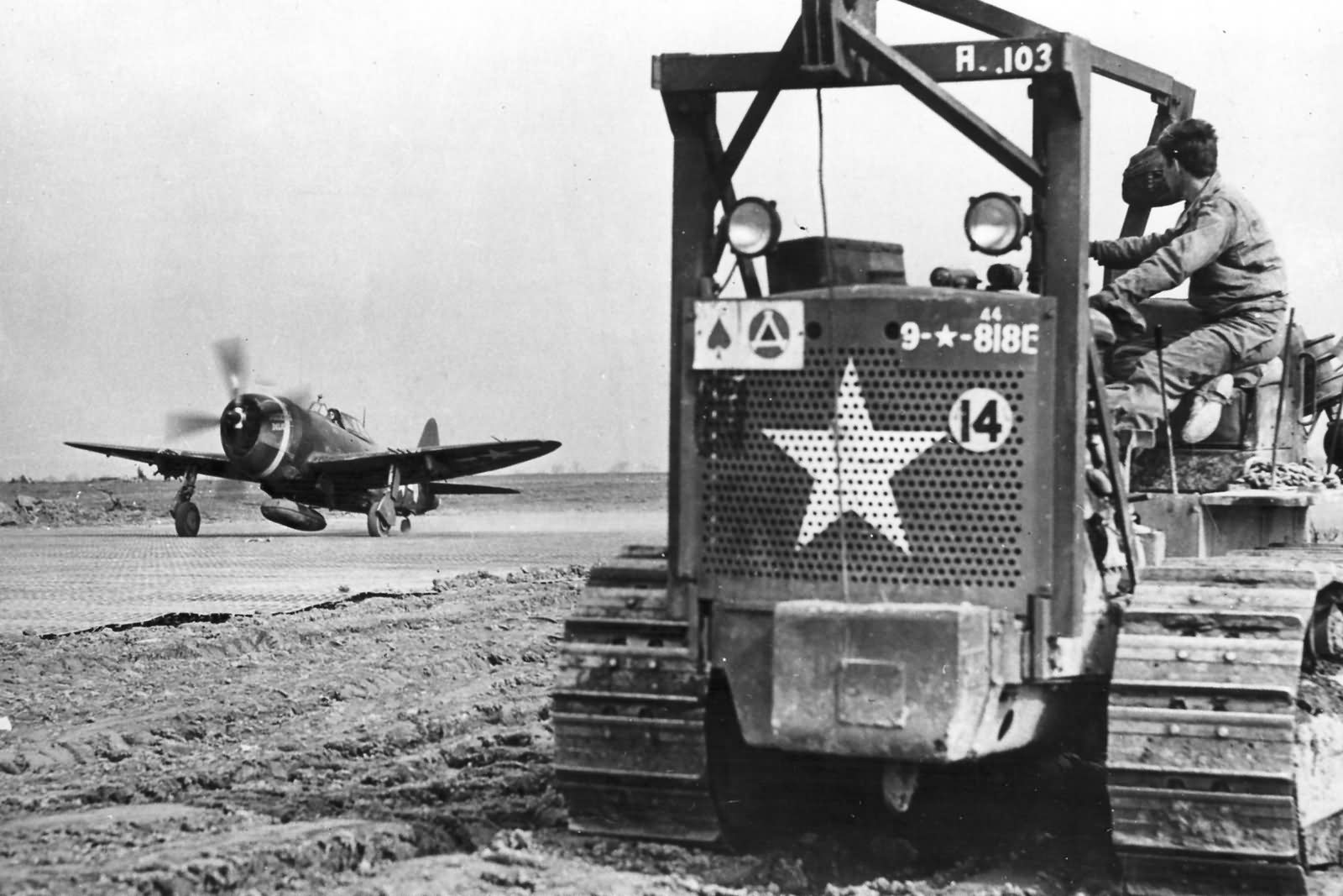 Taxing P-47 Thunderbolt of the 9th AF and Caterpillar D7 Tractor (818th Engineer Aviation Battalion) – France 1944