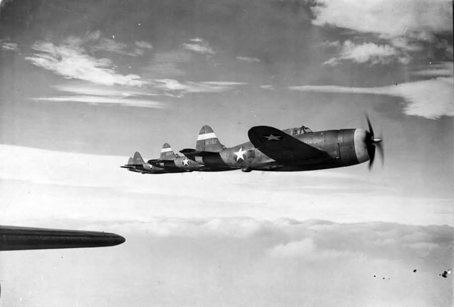 P-47 Thunderbolts of the 56th Fighter Group fly in formation 11 March 1943