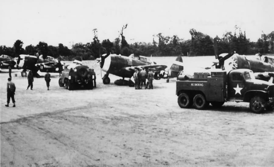 P-47 Thunderbolts of the 9th Air Force prepare for a mission in France