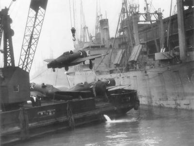 P-47 Hoisted from Liberty Ship Enroute to Airfield in England