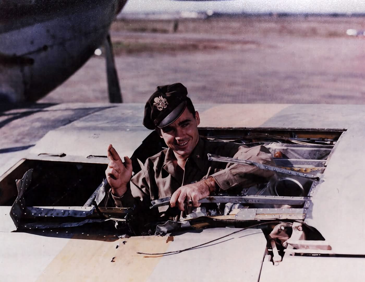 1lt James Fisk of the 309th FS 31st FG Standing In The Hole Left By Anti Aircraft Fire