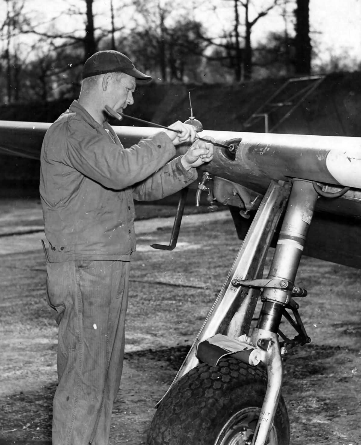 Armorer Cleans The 0,50 Caliber Machine Guns of the P-51B
