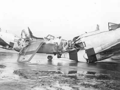 P-51D Mustangs 44-13709 and 44-13557 wrecked on airfield