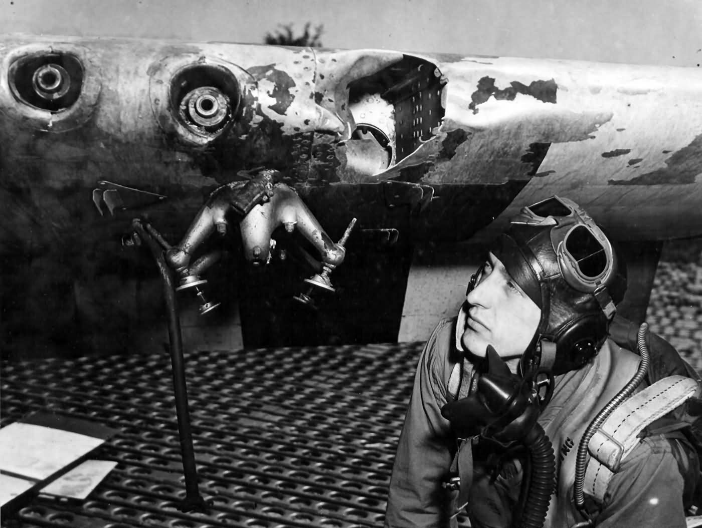 Pilot 1lt Howard Spaulding 375th FS 361st Fighter Group Inspects Battle Damage To The Left Wing Of His P-51B Mustang, Late June 1944