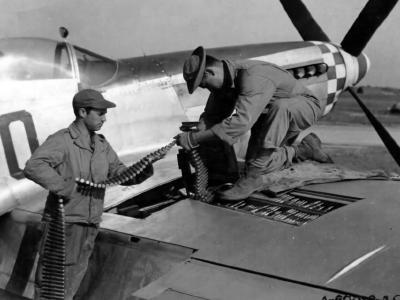 Putting Ammunition Belts In A North American P-51 Mustang In England 3 September 1944