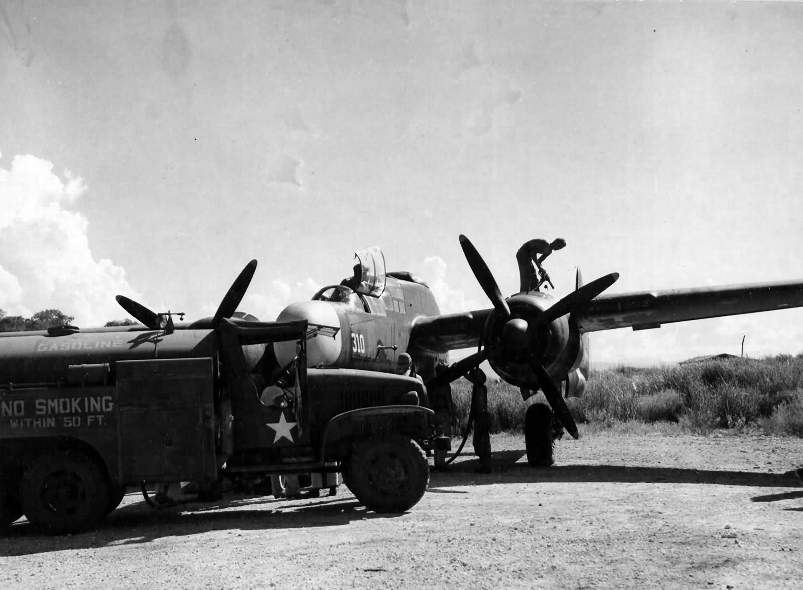 P-61A 42-5505 „310” of the 419th Night Fighter Squadron on Guadalcanal is refueled for another mission June 1944