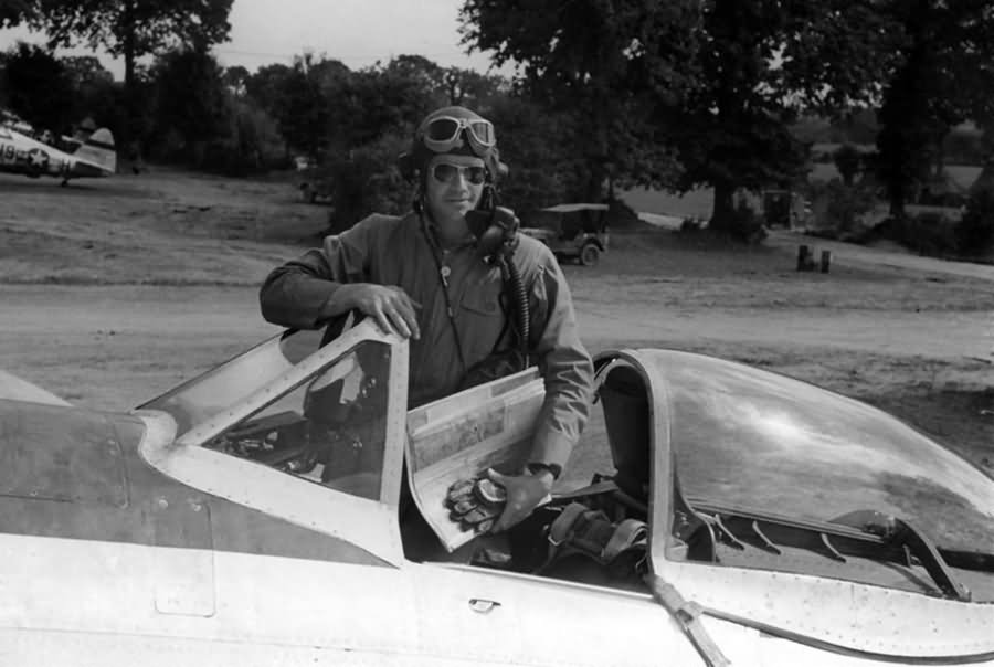 Colonel Bennick of the 373rd Fighter Group in the cockpit of his P-47 Thunderbolt