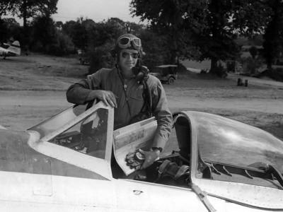 Colonel Bennick of the 373rd Fighter Group in the cockpit of his P-47 Thunderbolt