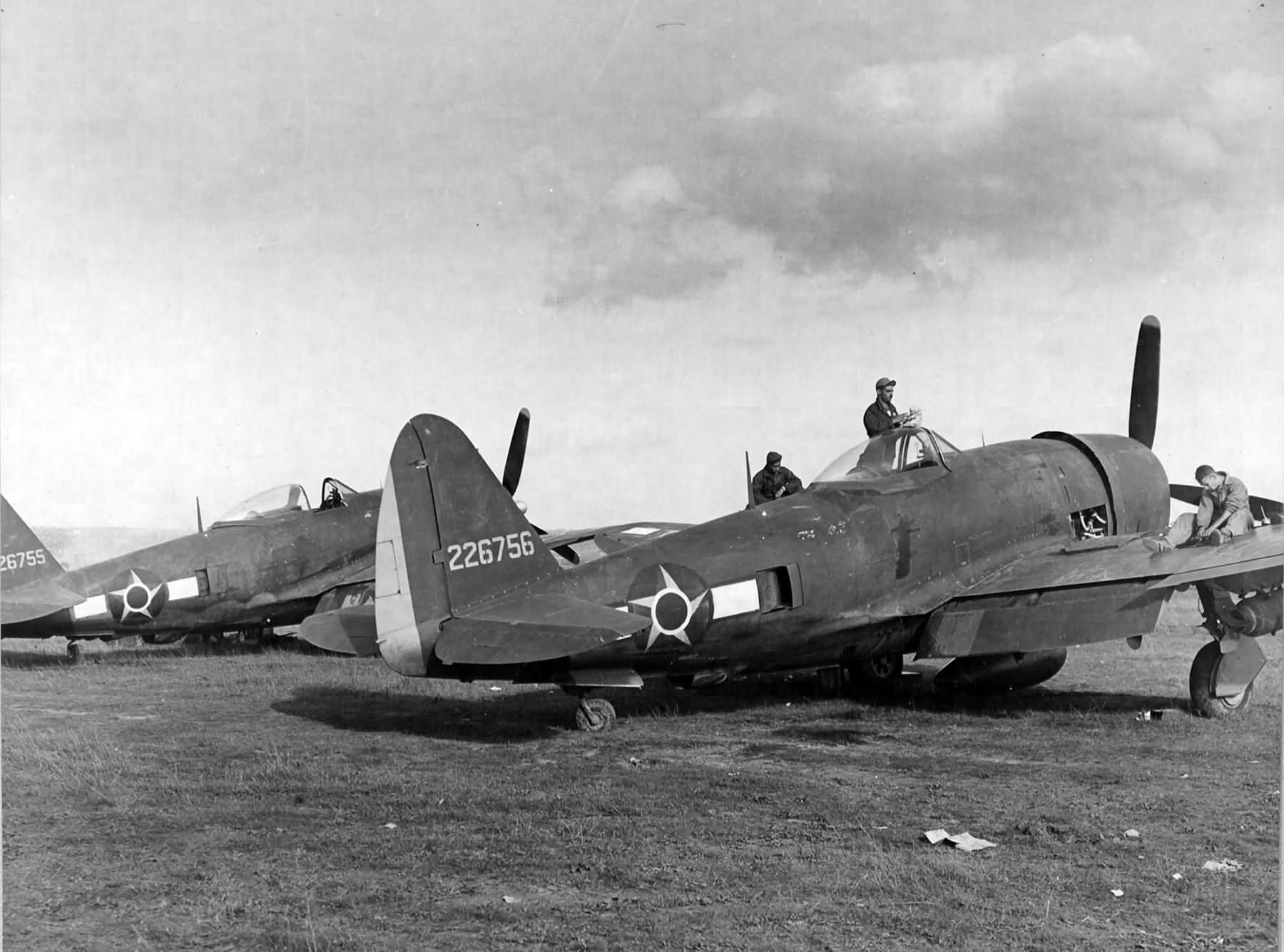 Ground crew of the 1st Brazil FS, 350th Fighter Group work on a P-47 42-26756 Italy