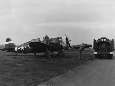 Ground crew of the 355th Fighter Group refuel P-47 Thunderbolt 42-8492