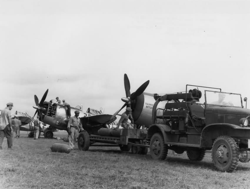 Ground personnel of the the 1st Air Commando Group work on P-47 Thunderbolt – India February 1945