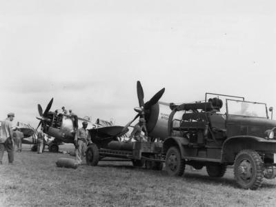 Ground personnel of the the 1st Air Commando Group work on P-47 Thunderbolt – India February 1945