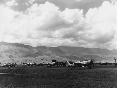 P-47 Thunderbolts lined up on airfield Philippines