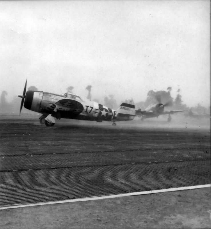 P-47 Thunderbolt coded I7-E of the 48th Fighter Group, 493rd FS line up for take off in Normandy June 1944