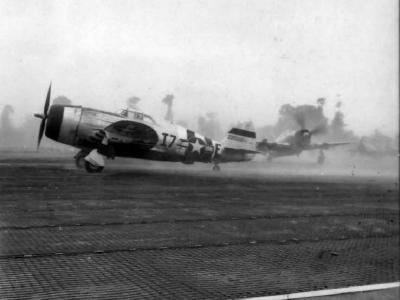 P-47 Thunderbolt coded I7-E of the 48th Fighter Group, 493rd FS line up for take off in Normandy June 1944
