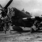 Ground personnel of the 358th FG prepare to start the engine of a P-47 Thunderbolt „Chunky”